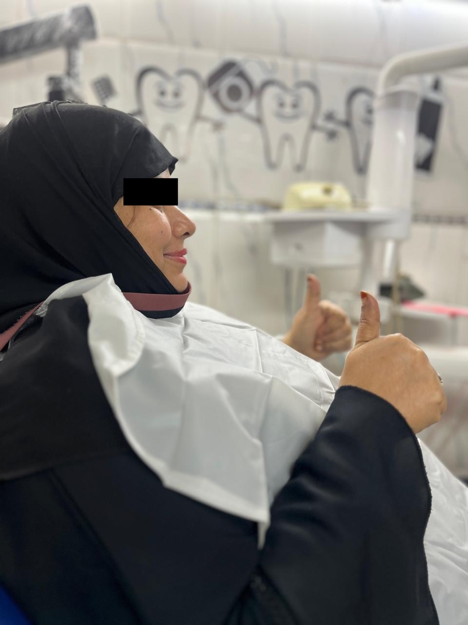 Happy Patient Showing Smile Results